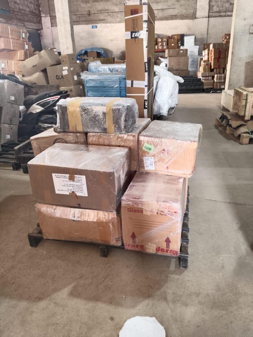 Wrapped boxes stacked on a warehouse pallet