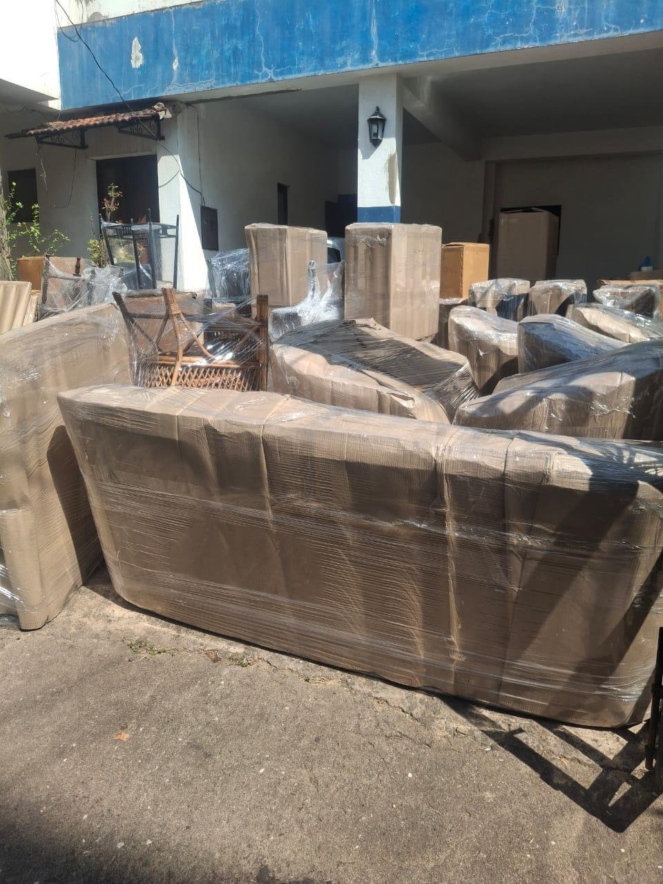 Household furniture carefully wrapped for home shifting