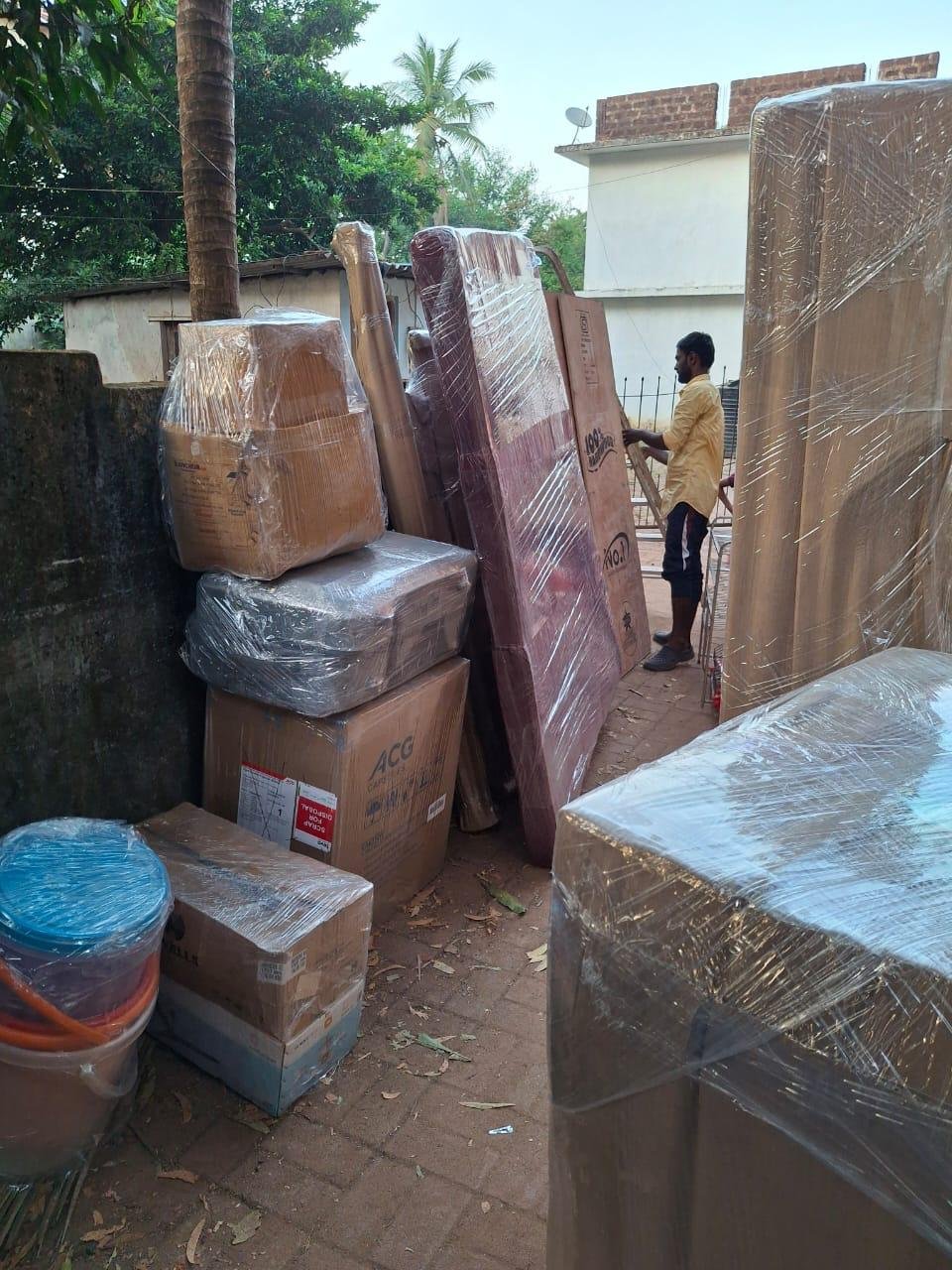 Furniture and household items wrapped for packing and unpacking